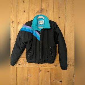 Vintage Skyr Women's Black and Teal Colorblock Puffer Jacket with Purple Accents